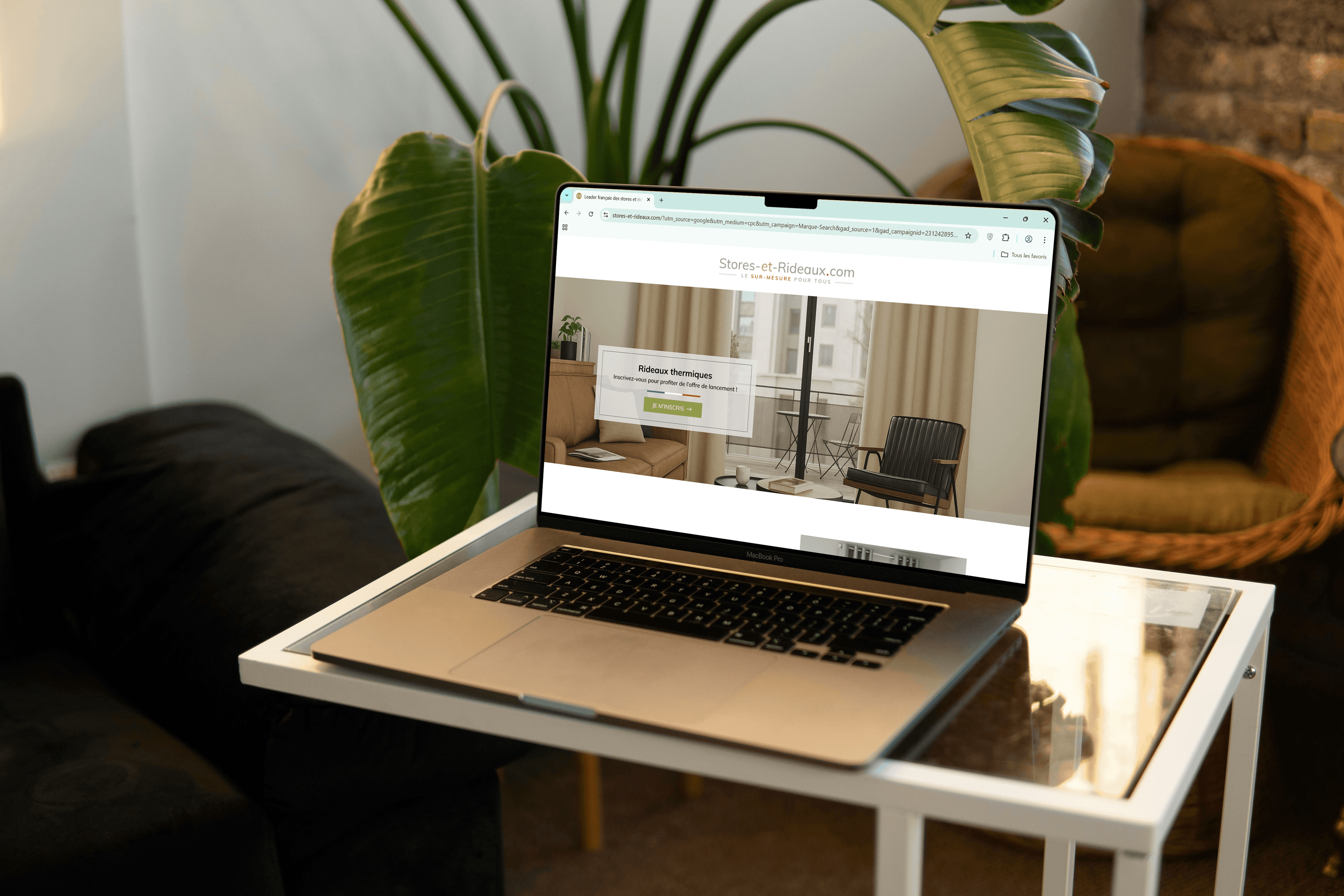 Free MacBook Pro on Small Table Mockup.png